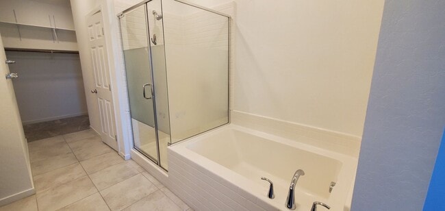 Building Photo - Beautiful townhome features a bright, open-concept layout
