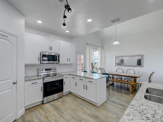 Building Photo - (1 Month Free with 16-Month Lease) Updated 3BR/2.5BA Home with Fireplace & Open Layout