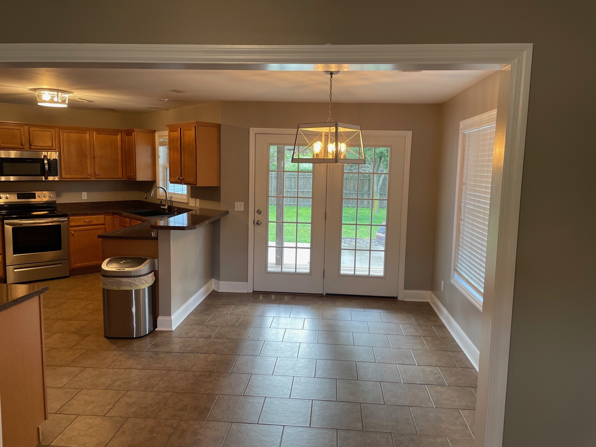 Dining Area, Doors to Patio - 324 Oxford Cir