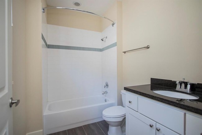 Building Photo - Contemporary townhome, rooftop terrace awa...