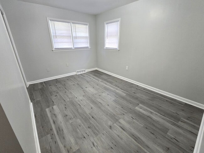 Building Photo - 3/2 with Fenced Yard; In-town and Near an ...