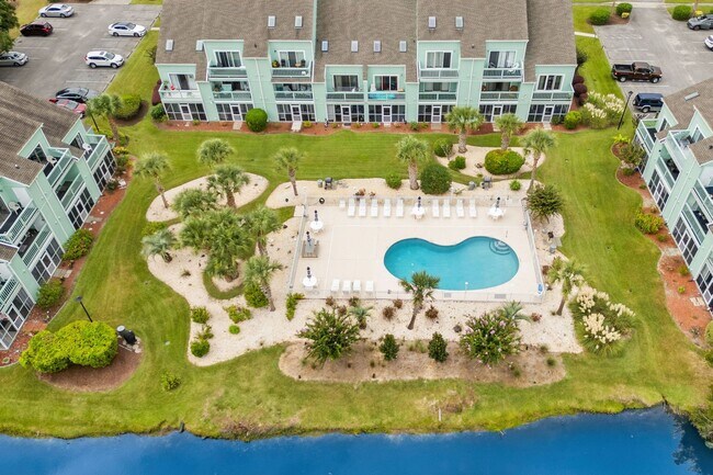 Building Photo - First Floor Seasonal Rental Available December 1, 2025-June 30, 2026-Golf Colony 40S