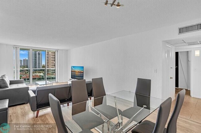 Building Photo - 19390 Collins Ave
