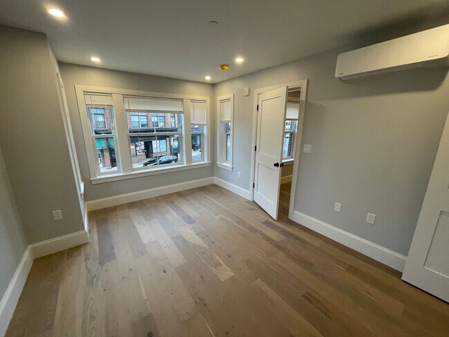 Building Photo - New Modern Elevator Building with Garage P...