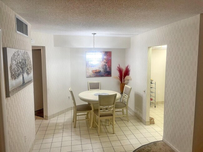 Building Photo - 9301 Lime Bay Blvd