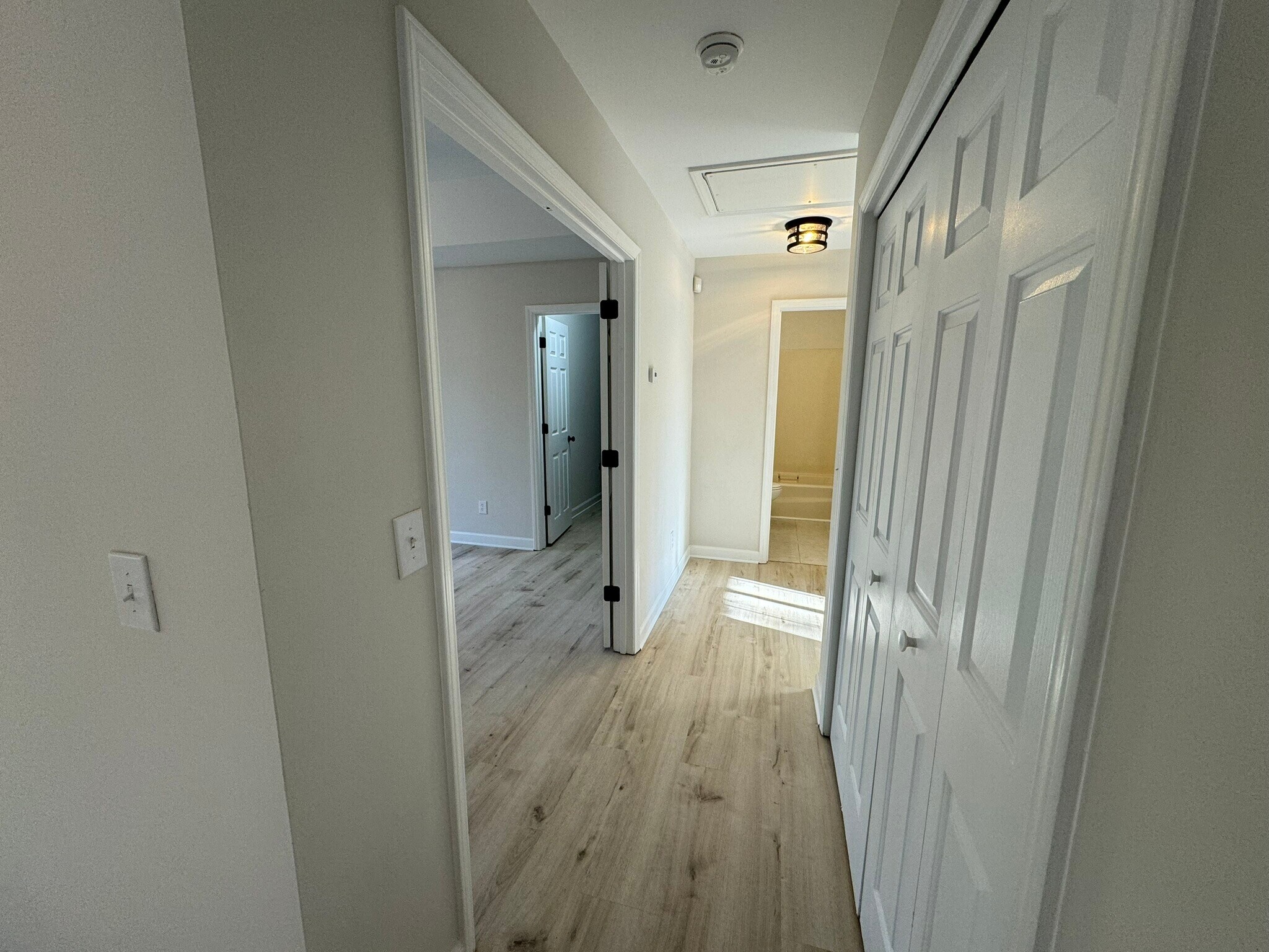 Hallway with laundry - 8017 Pine Oak Rd