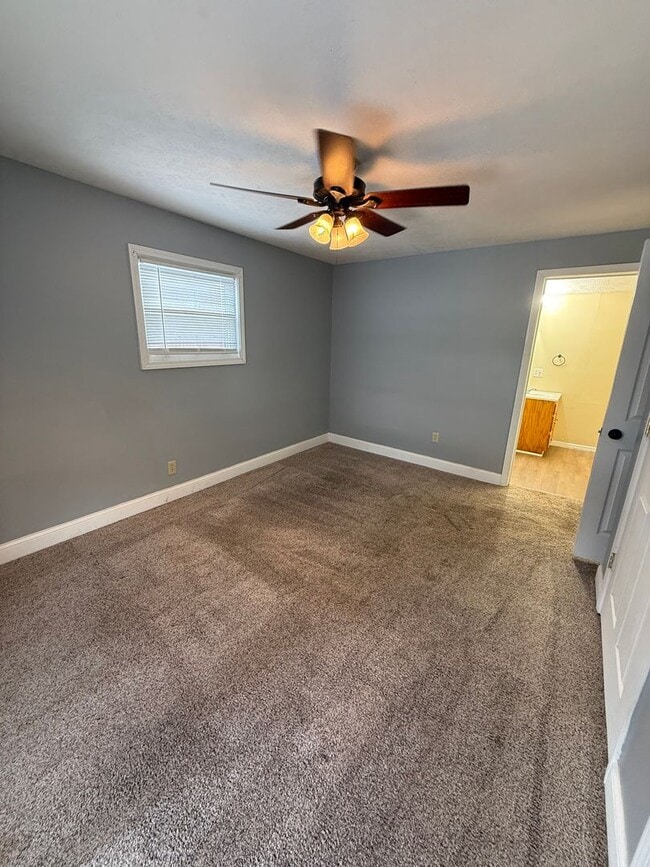 Building Photo - Spacious 4-Bedroom Home with Huge Fenced Backyard!