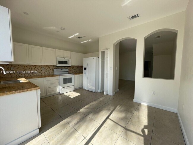 Building Photo - 5440 NW 107th Ave