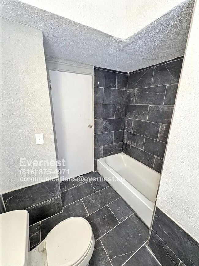 Building Photo - Charming 4-Bedroom Home with Finished Base...