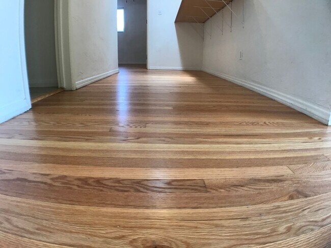 Building Photo - BEAUTIFUL WOOD FLOORS IN THIS- 5 BED 2 BATHROOM- Includes maid service
