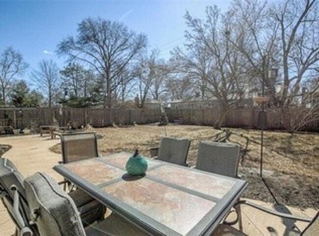 Building Photo - {5611} Updated OP Ranch + Two Car Garage + Fenced Yard and Stamped Concrete Patio Perfect for Spr...