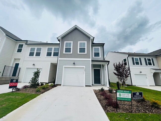 Building Photo - Applications pending! Stunning new end-unit 3 bedroom 2.5 bath townhouse in N High Point with att...