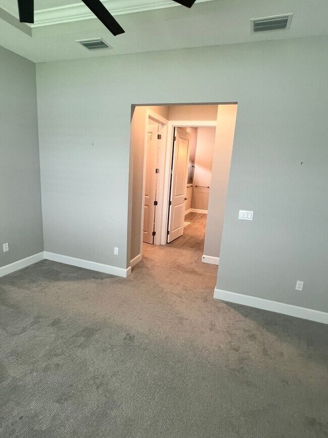 Building Photo - STUNNING LAKEFRONT 3 BEDROOM, 2.5 BATH HOM...