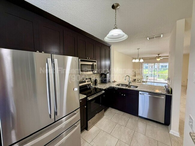 Building Photo - 12311 Kensington Lakes Dr