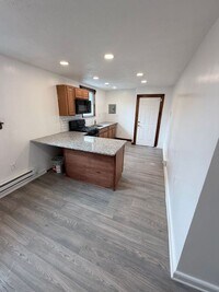 Building Photo - Perfect location, private . Clean , modernized and bright