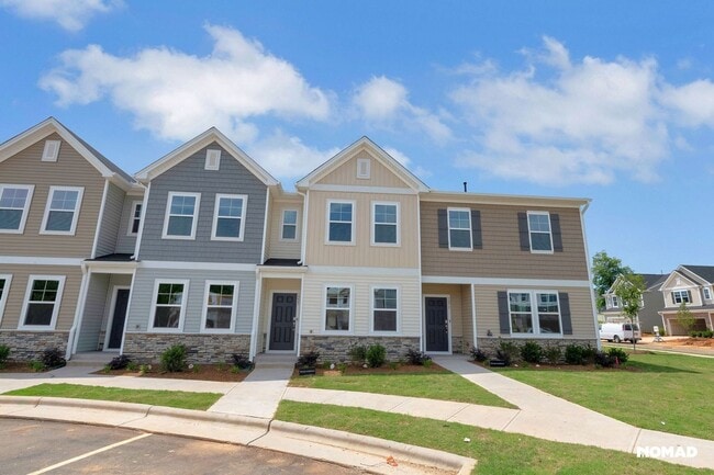 Building Photo - Brand New Charming 2 master BR Townhome in...