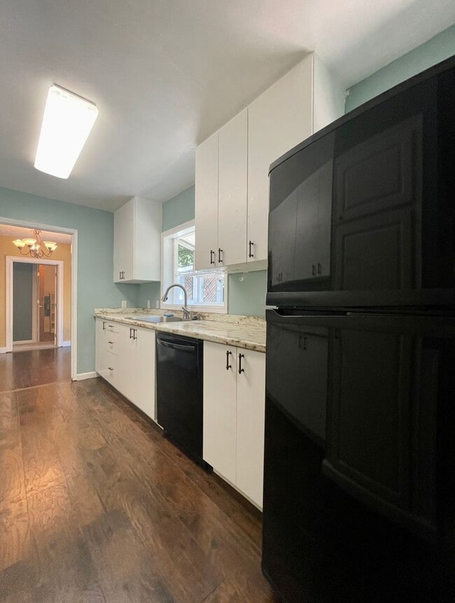 Building Photo - Updated Ranch with Large Fenced Yard, Tucked Off Walker Road~ Gas Fireplace~ Great Natural Light~...