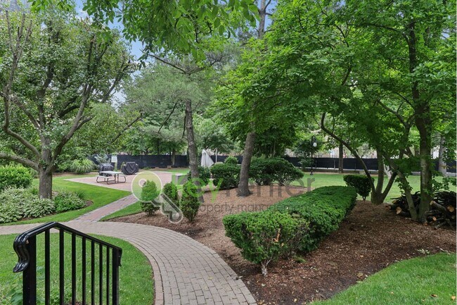 Building Photo - Spacious 2BR/2BA Duplex in Gated Community with Parking, Washer/Dryer & NYC Skyline Views