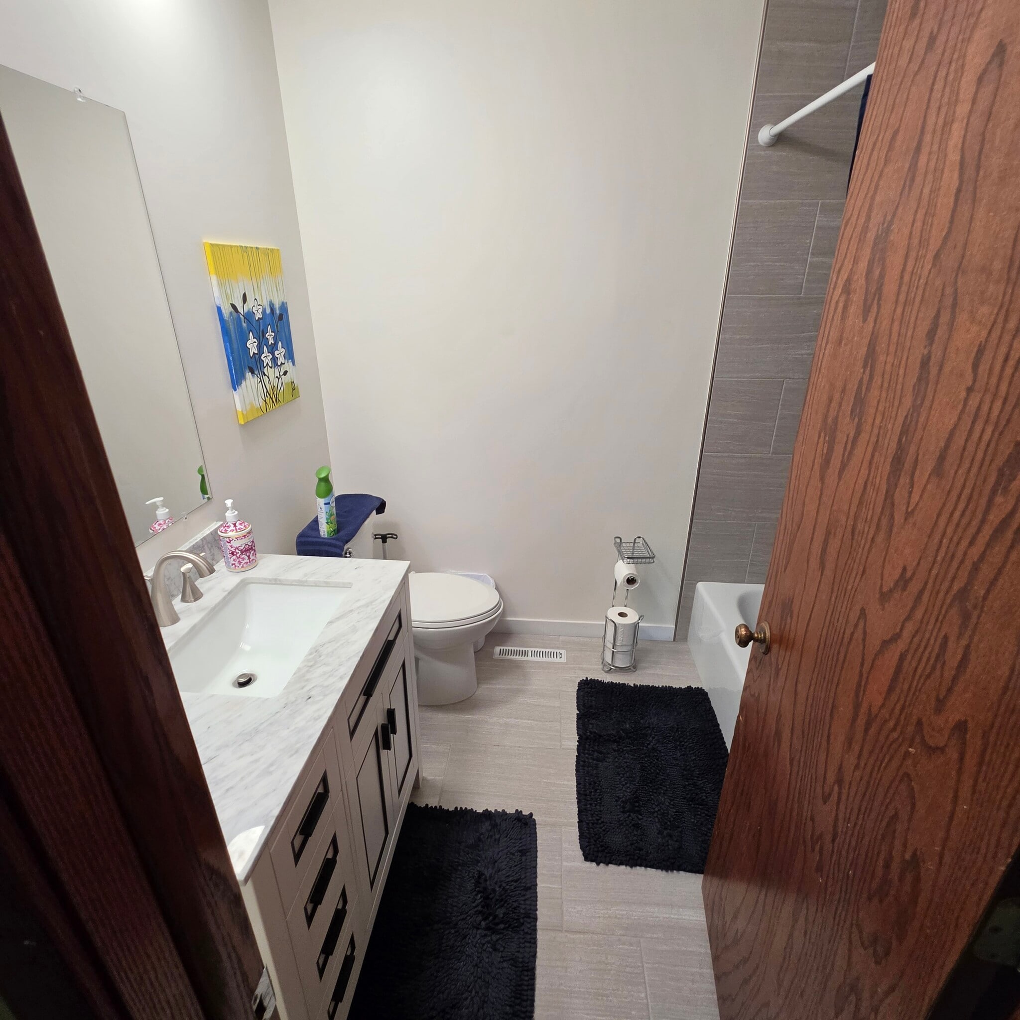 full bath on main level. tub/shower with ceramic surround, new vanity - 2248 139th Ave NW