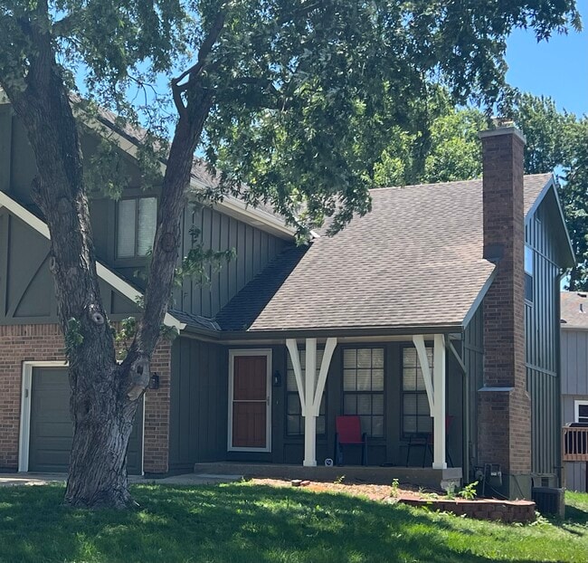 Front door/garage (tree has been removed) - 14103 W 88th Terrace