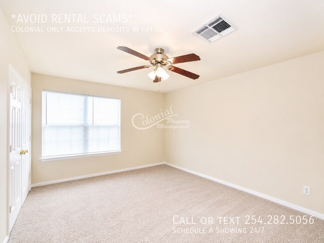 Building Photo - 5406 Boot Scootin Ct