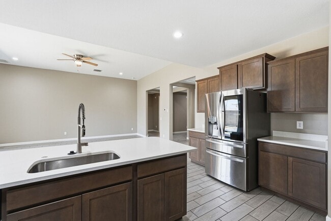 Building Photo - Spacious 5-Bedroom Home with Open Floor Plan & Private Backyard