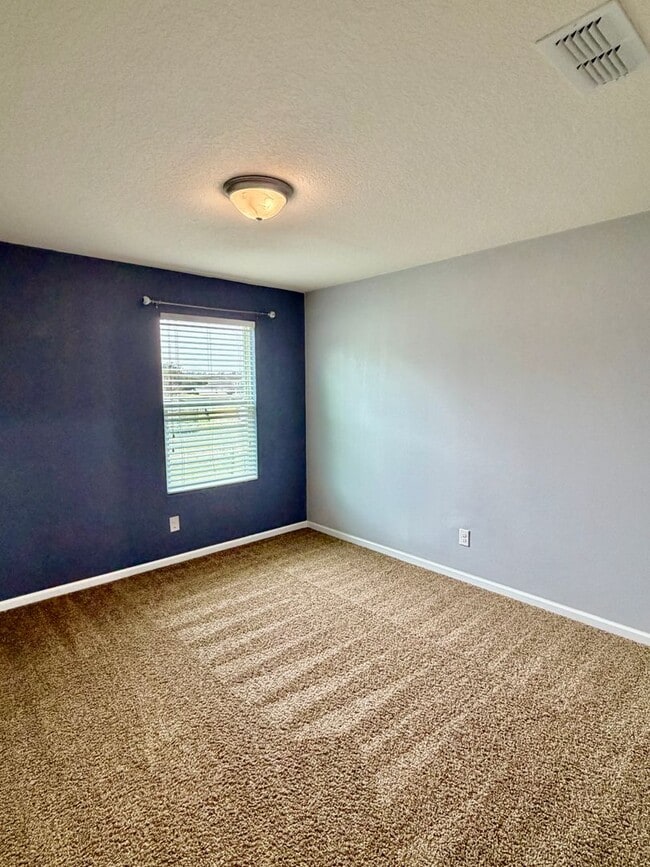 Building Photo - Spacious 5 Bedroom, 3 Bathroom Home with Flex Room, Loft & Pond View