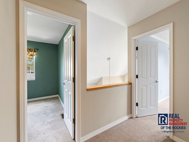 Building Photo - Charming Fort Collins Townhome with Private Patio, Vaulted Ceilings & Prime Location!