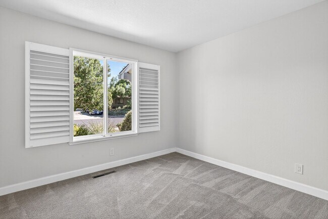 Building Photo - 2,003 Sq Ft Modern 4BR/2BA: Solar, EV Charging & Private Orchard!