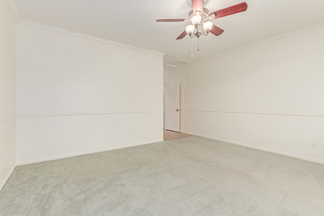 Building Photo - "Charming 2-Bedroom + Den Oasis with Spaci...