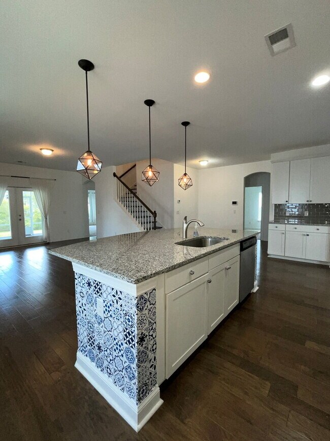 Building Photo - "Spacious 4-Bed Oasis with Stunning Lake V...