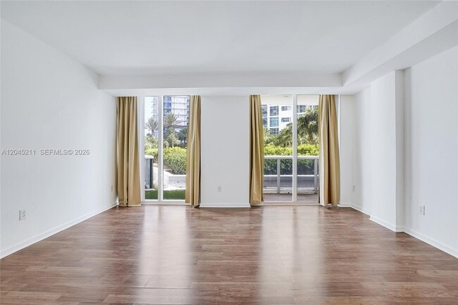 Building Photo - 10275 Collins Ave