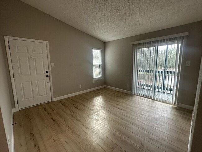 Building Photo - ** Move in Special HALF off your first months rent** NEWLY renovated 2 bedroom/1 bath condo in Ca...