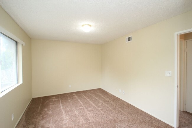 Building Photo - Welcome to this beautifully updated two-story condo