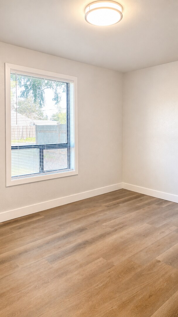 Building Photo - Renovated 3-Bedroom Home with Fenced Yard, Fireplace & In-Unit Laundry