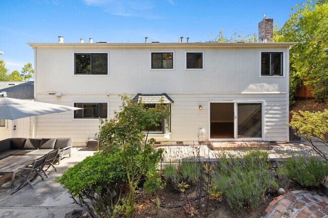 Building Photo - Elegant Two-Story Home with Backyard Oasis...