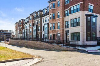 Building Photo - Your new home awaits you! Luxury Townhouse...