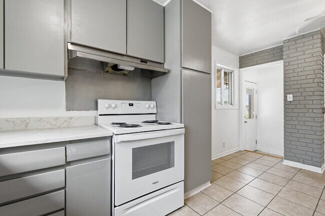 Building Photo - Charming 4-Bedroom with 2 Baths and Finished Basement!
