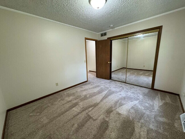 Building Photo - Love Grows — Spacious 2-Story Townhome