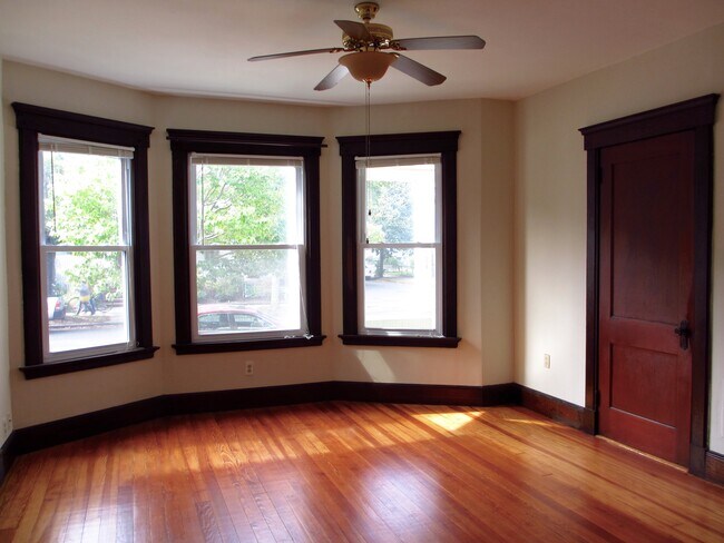 Living room - bright & airy; ceiling fan - 127 Foster St