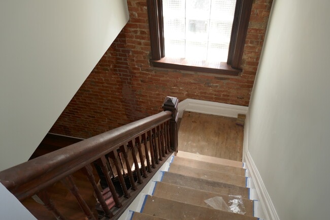 Steps leading down to entry foyer - 875 Lexington Ave