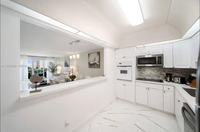 Building Photo - 19370 Collins Ave