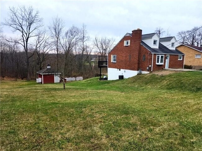 Building Photo - Four Bedroom Home In Fort Cherry School District With One Acre!