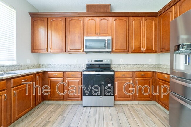 Building Photo - 13321 Moss Park Ridge Dr