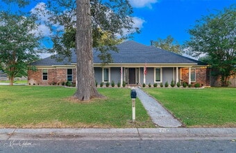 Building Photo - "Luxurious 4-Bed Retreat with Pool & Fireplace in Bossier City - Your Dream Home Awaits!"