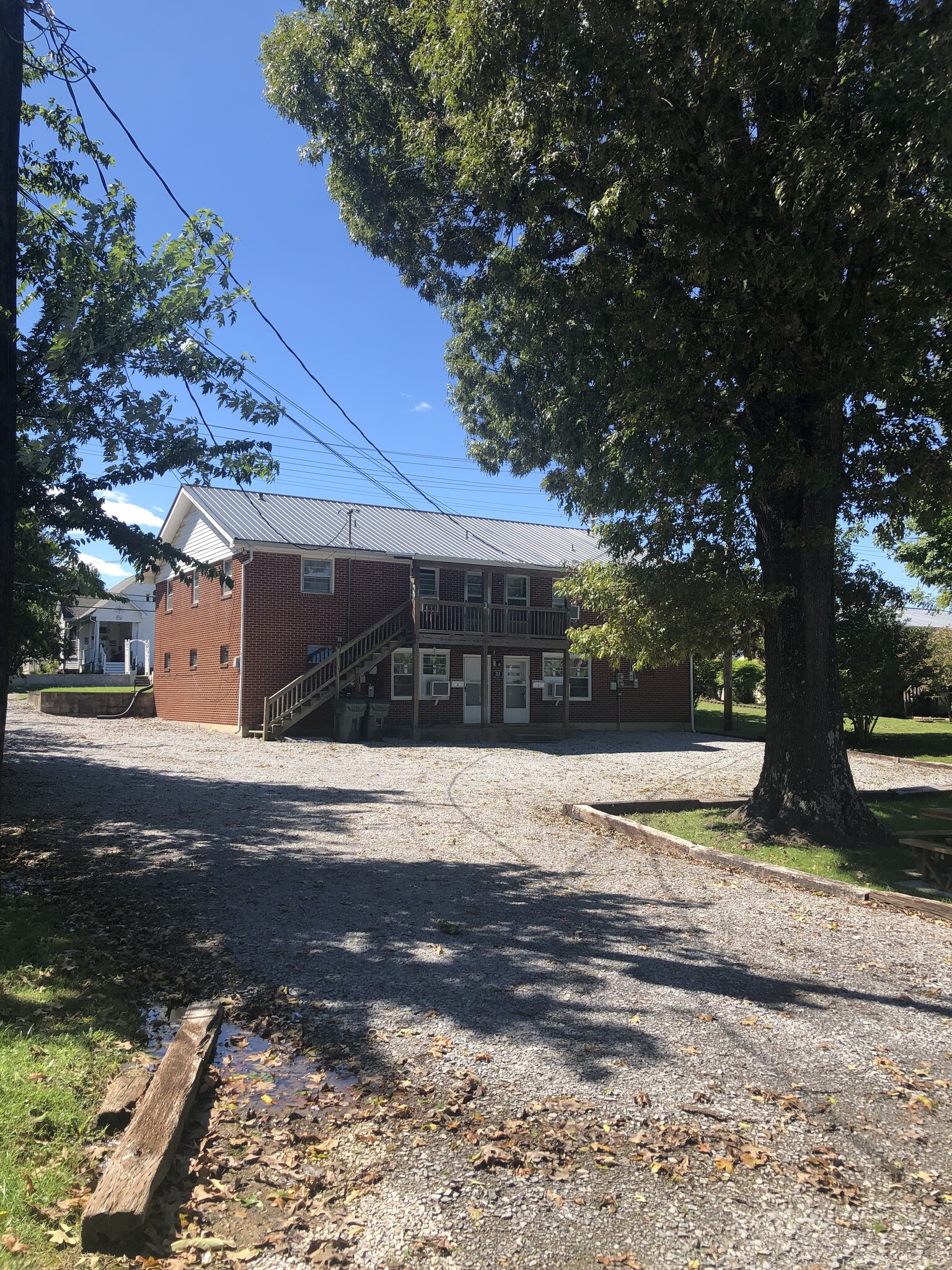 Rear of Quadplex from alley. Parking - 213 E Walnut St