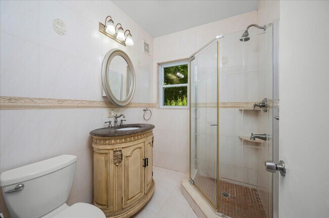 Building Photo - Elegant Multi-Level Brick Residence with Outdoor Oasis