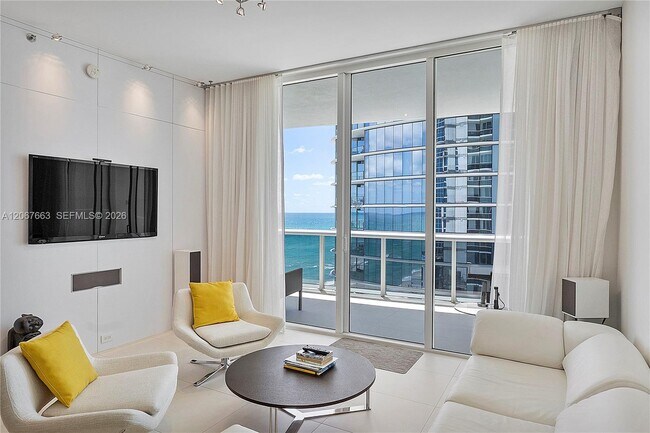 Building Photo - 15811 Collins Ave