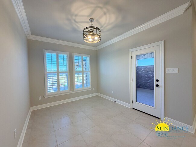 Building Photo - Custom-crafted details shine throughout this stunning 3-bedroom home in Magnolia at the Bluffs in...