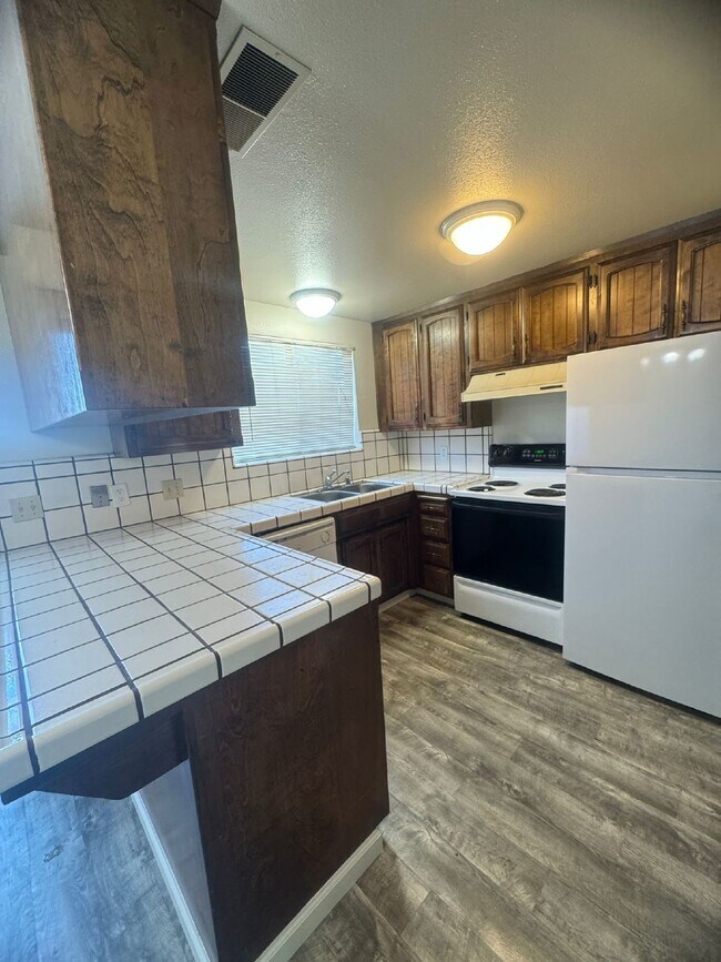 Building Photo - Two Bedroom Townhome Available For Immedia...